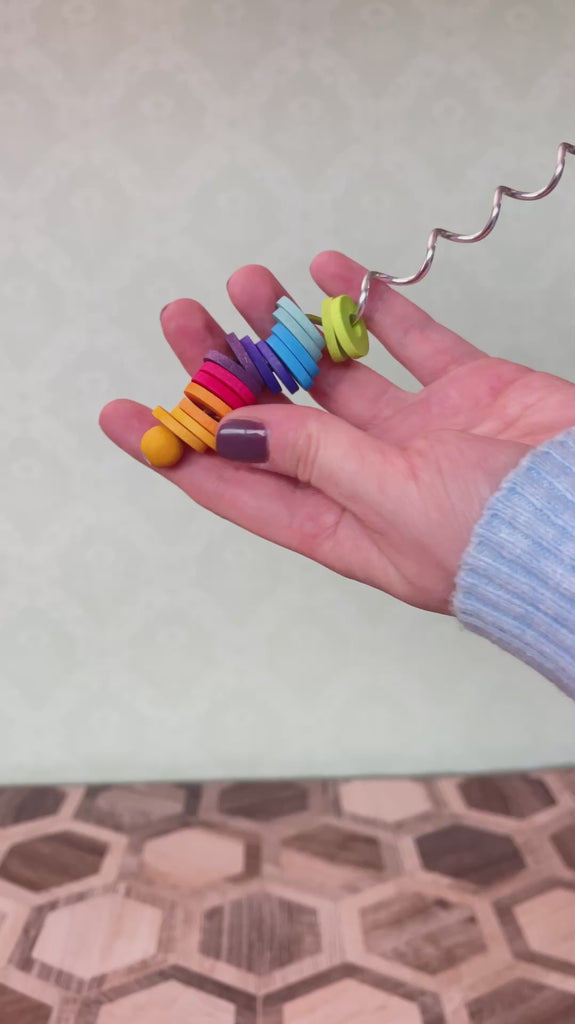 Mini Grimm's spirelli, a satisfying wooden spiral fidget toy, for sale at Babipur.