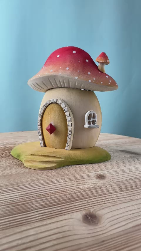 Wooden Toadstool Toy House with opening door, a small rounded window and mini toadstool chimney by Bumbu.