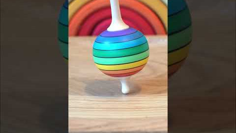 Mader Rainbow Lolly Spinning Top demonstration video, how to spin. 