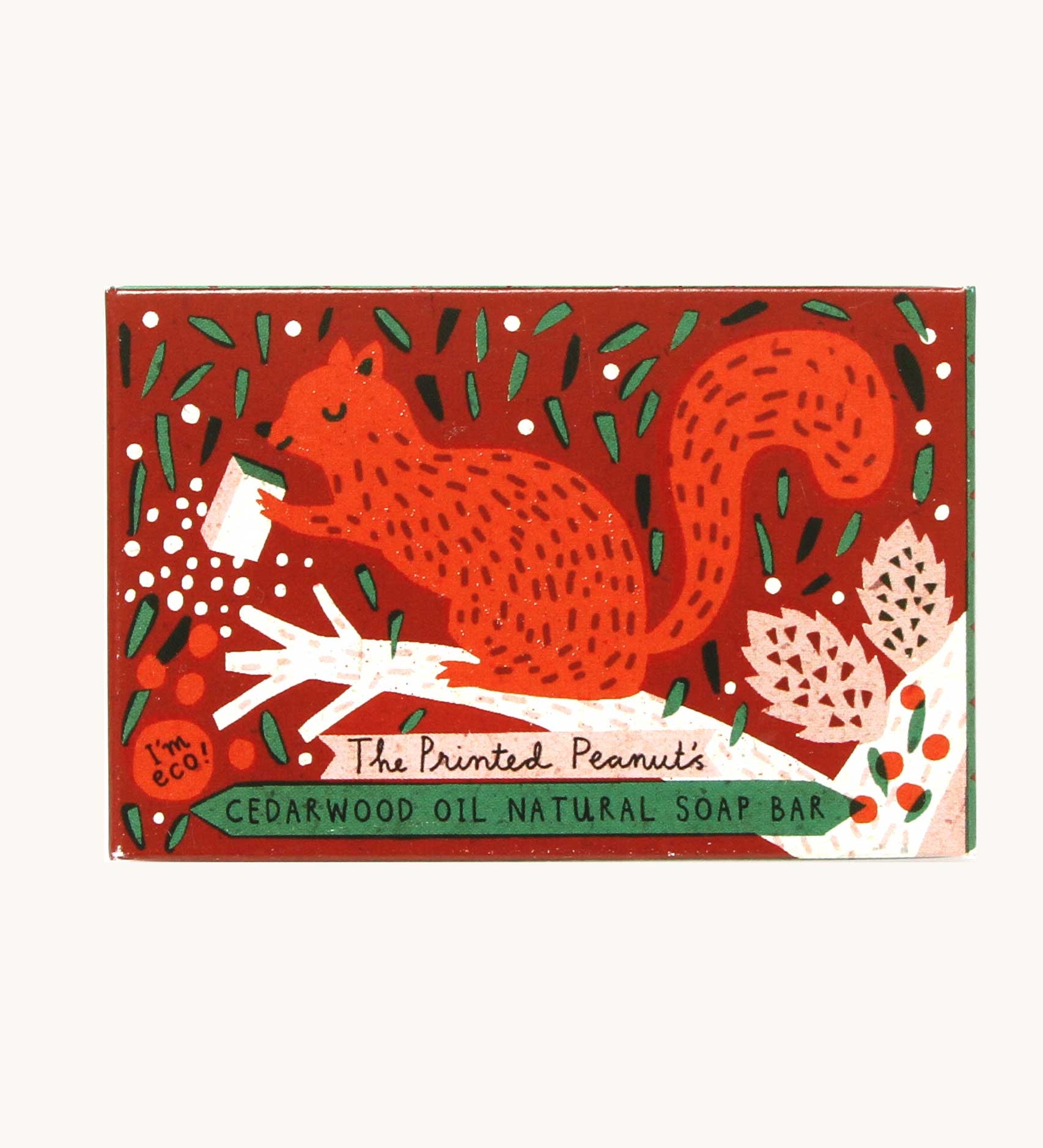 The Printed Peanut cedarwood natural handmade soap shown in it's decorative cardboard box packaging.