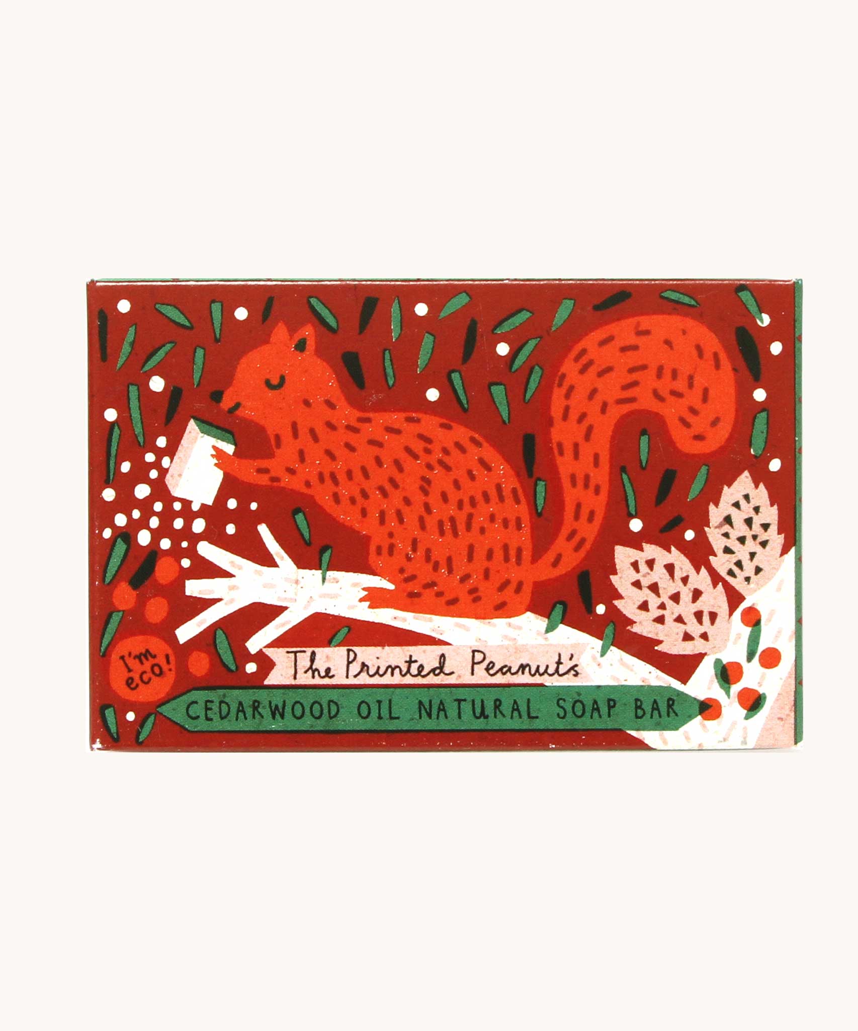 The Printed Peanut cedarwood natural handmade soap shown in it's decorative cardboard box packaging.