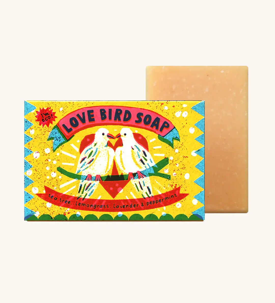 Printed Peanut love bird natural handmade soap bar standing next to its decorated box showing 2 white birds infront of a heart