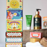 Stack of Printed Peanut natural soaps in the illustrated boxes. Other Babipur hair and beauty products can be seen blurred in the background.