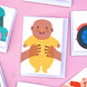 The Printed Peanut new baby greeting card with baby in yellow outfit, displayed with other illustrated mini gift cards on pink background