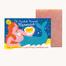 The Printed Peanut mermaid rose natural handmade soap. The decorative packaging box is shown next to the pink bar of soap. 