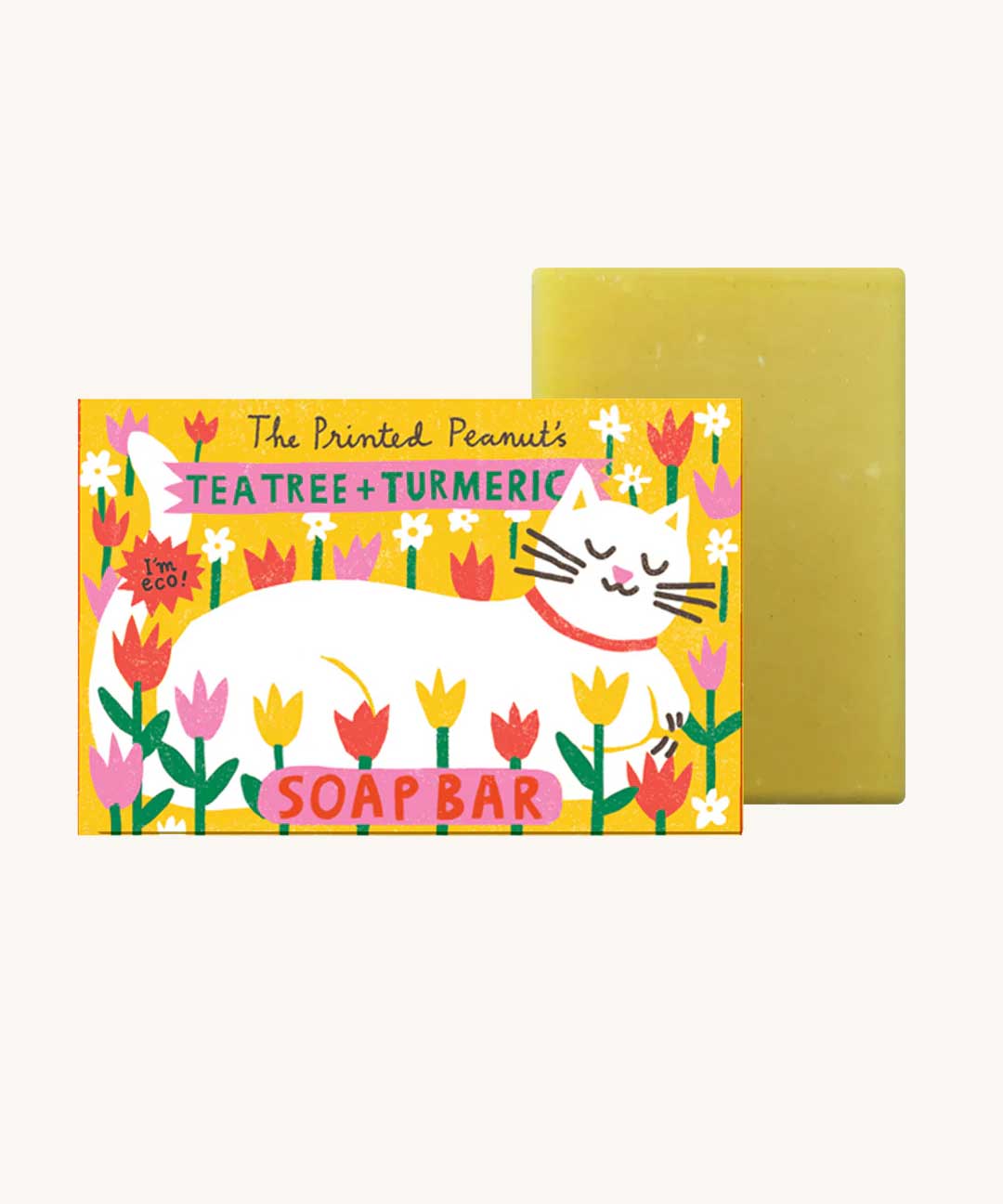 The Printed Peanut tea tree & turmeric natural handmade soap bar in a decorative cardboard packaging box.