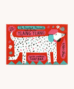 The Printed Peanut ylang ylang natural handmade soap shown in it's decorative cardboard packaging box.