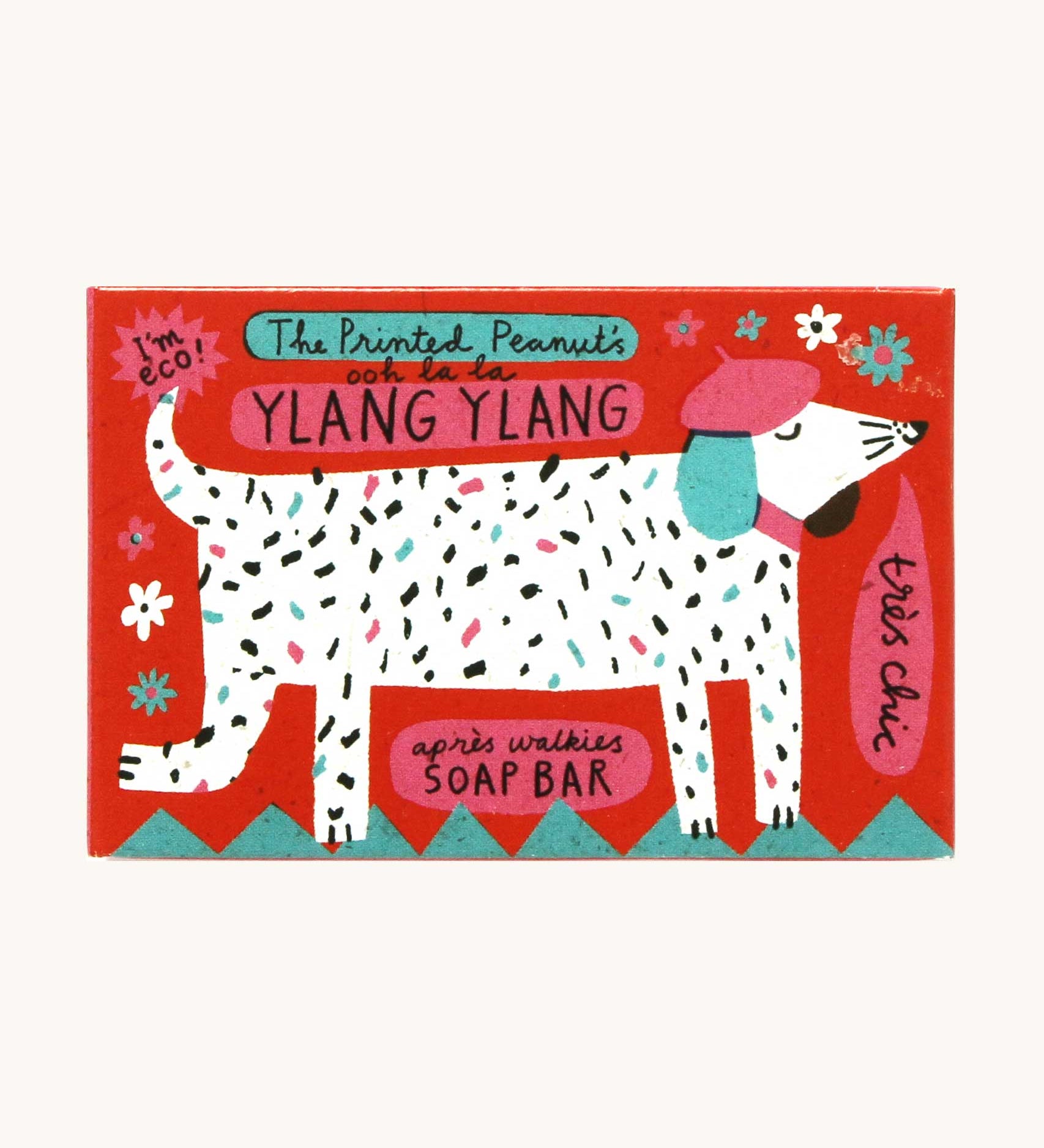 The Printed Peanut ylang ylang natural handmade soap shown in it's decorative cardboard packaging box.