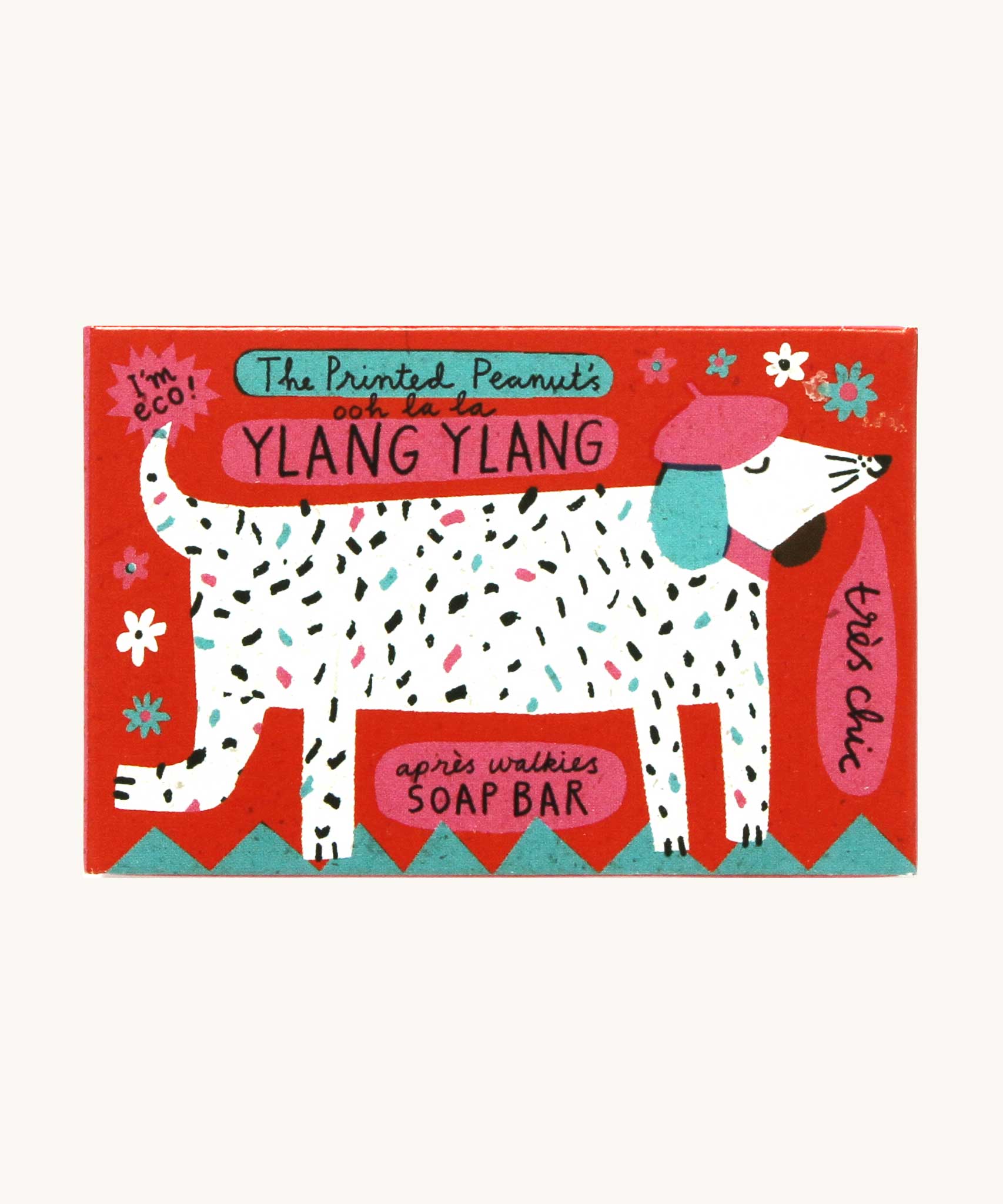 The Printed Peanut ylang ylang natural handmade soap shown in it's decorative cardboard packaging box.