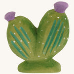Pin cushion cactus with purple flowers on a cream background