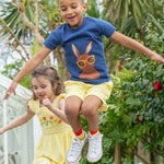 A closer view of the yellow draw string and waist band of the Frugi Archie Seersucker Shorts - Dandelion. A bright yellow and white striped short