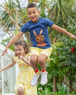 A closer view of the yellow draw string and waist band of the Frugi Archie Seersucker Shorts - Dandelion. A bright yellow and white striped short