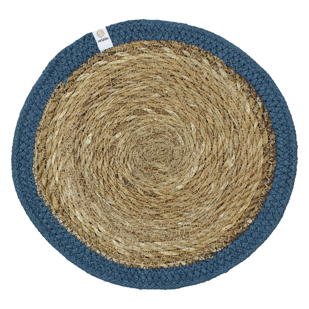 The ReSpiin seagrass and jute natural tablemat with a dark denim coloured ring.