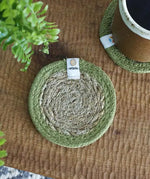ReSpiin natural jute coaster with green rim on a table 