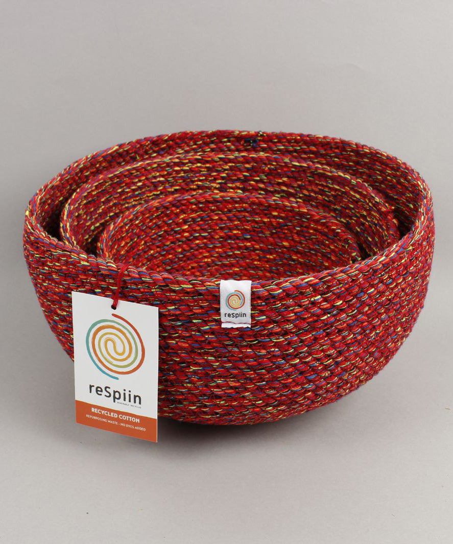 A close up of the 3 Respiin multicoloured recycled cotton bowls showing each bowl inside eachother 