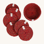 A set of 6 Respiin multicoloured recycled cotton coasters with a matching holder. Features a brand patch stitched on the rim.