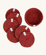A set of 6 Respiin multicoloured recycled cotton coasters with a matching holder. Features a brand patch stitched on the rim.