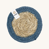 The ReSpiin natural jute and seagrass coaster in denim blue.