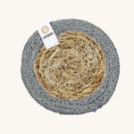 The ReSpiin natural jute and seagrass coaster in grey.