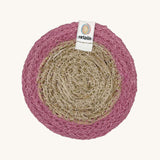 The ReSpiin natural jute and seagrass coaster in pink.