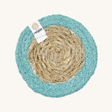 The ReSpiin natural jute and seagrass coaster in turquoise.