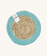 The ReSpiin natural jute and seagrass coaster in turquoise.