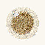 The ReSpiin natural jute and seagrass coaster in white.