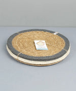 Stack of Respiin set of 6 jute table mats tied up with and held with yarn