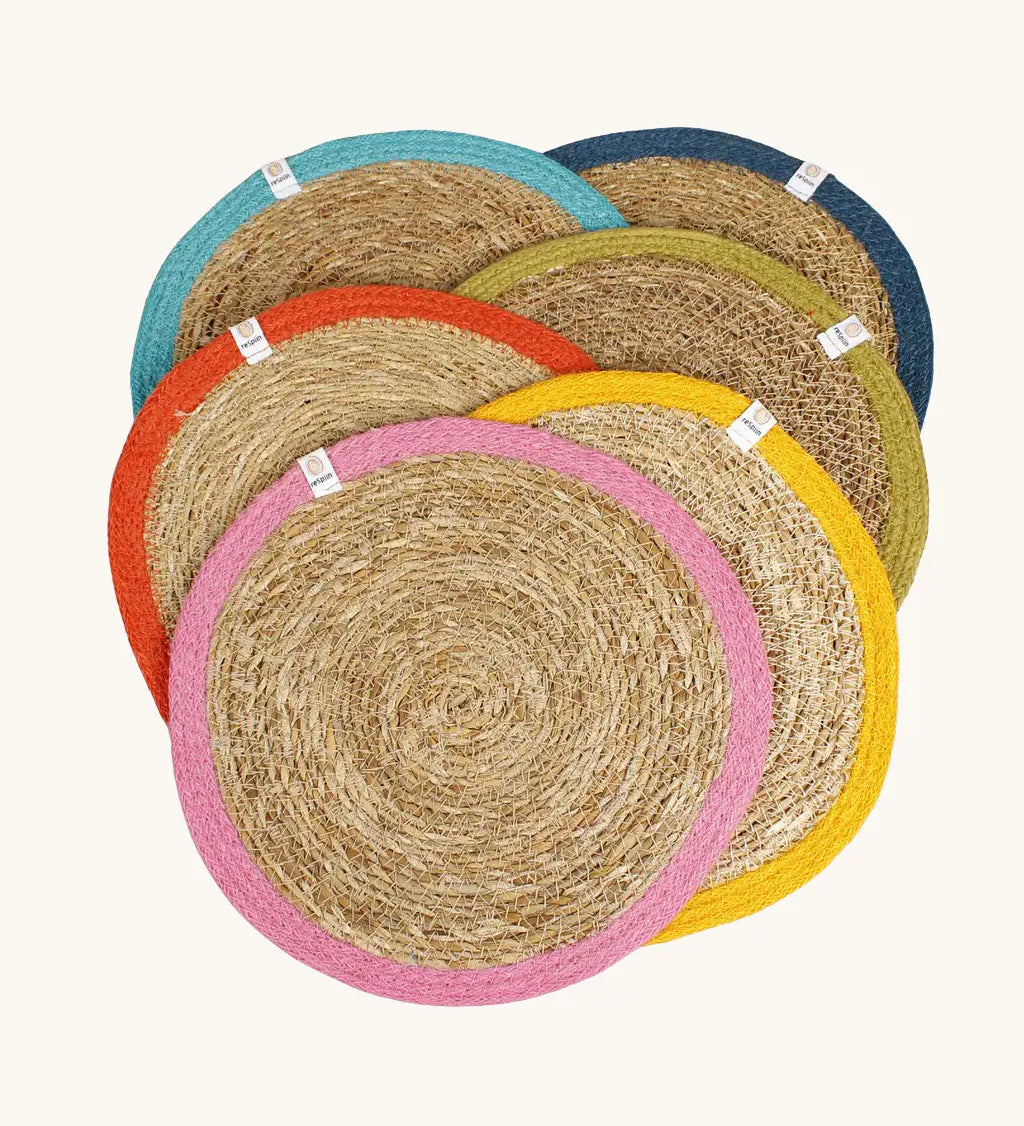 Respiin set of 6 jute table mats laid flat showing rainbow inspired colour rim on each mat
