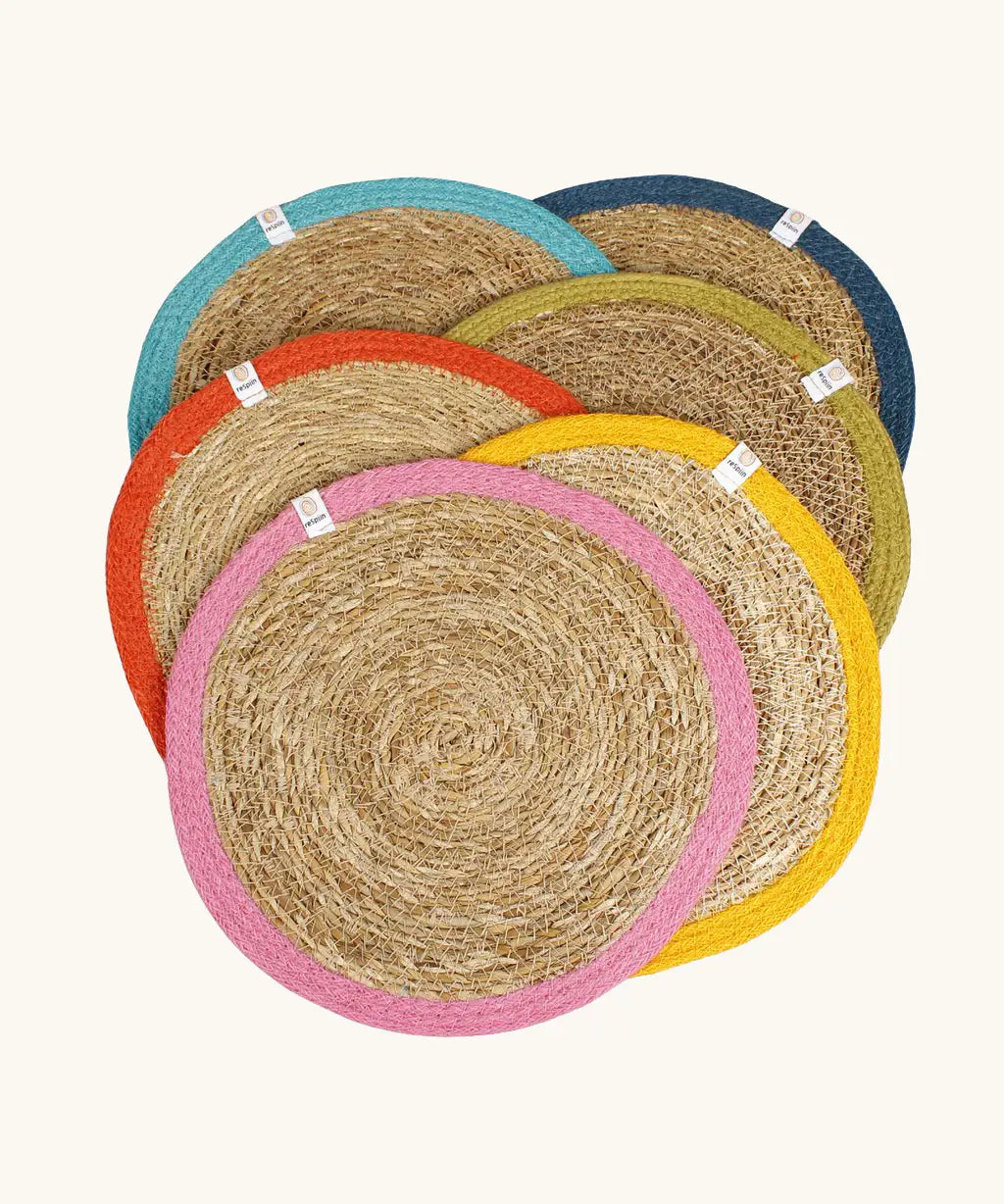 Respiin set of 6 jute table mats laid flat showing rainbow inspired colour rim on each mat