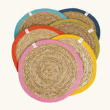Respiin set of 6 jute table mats laid flat showing rainbow inspired colour rim on each mat
