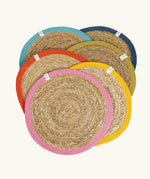 Respiin set of 6 jute table mats laid flat showing rainbow inspired colour rim on each mat