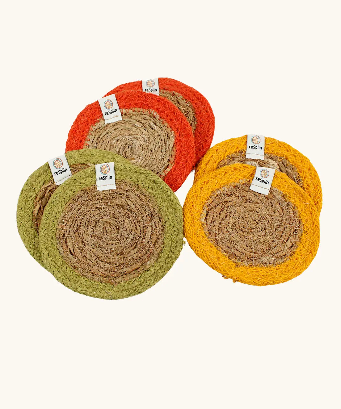 Set of 6 ReSpiin natural jute coasters with a yellow orange and green trim