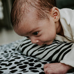  spotty Dalmatian print on the Etta Loves Reversible Organic Cotton Baby Play Mat - Animal Print