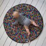 A closer look at the  'Baby' print on the Etta Loves X Keith Haring Reversible Organic Cotton Baby Play Mat