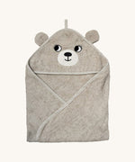 The Roommate kids organic hooded towel, in a grey colour with an embroidered bear face and bear ears. 