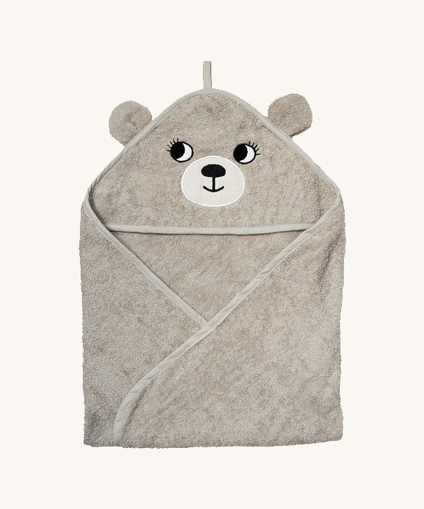 The Roommate kids organic hooded towel, in a grey colour with an embroidered bear face and bear ears. 