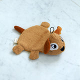 Roommate organic cotton dog washcloth bath toy shown alone on a light marble surface, highlighting the embroidered facial features, soft terry fabric, and hanging loop.