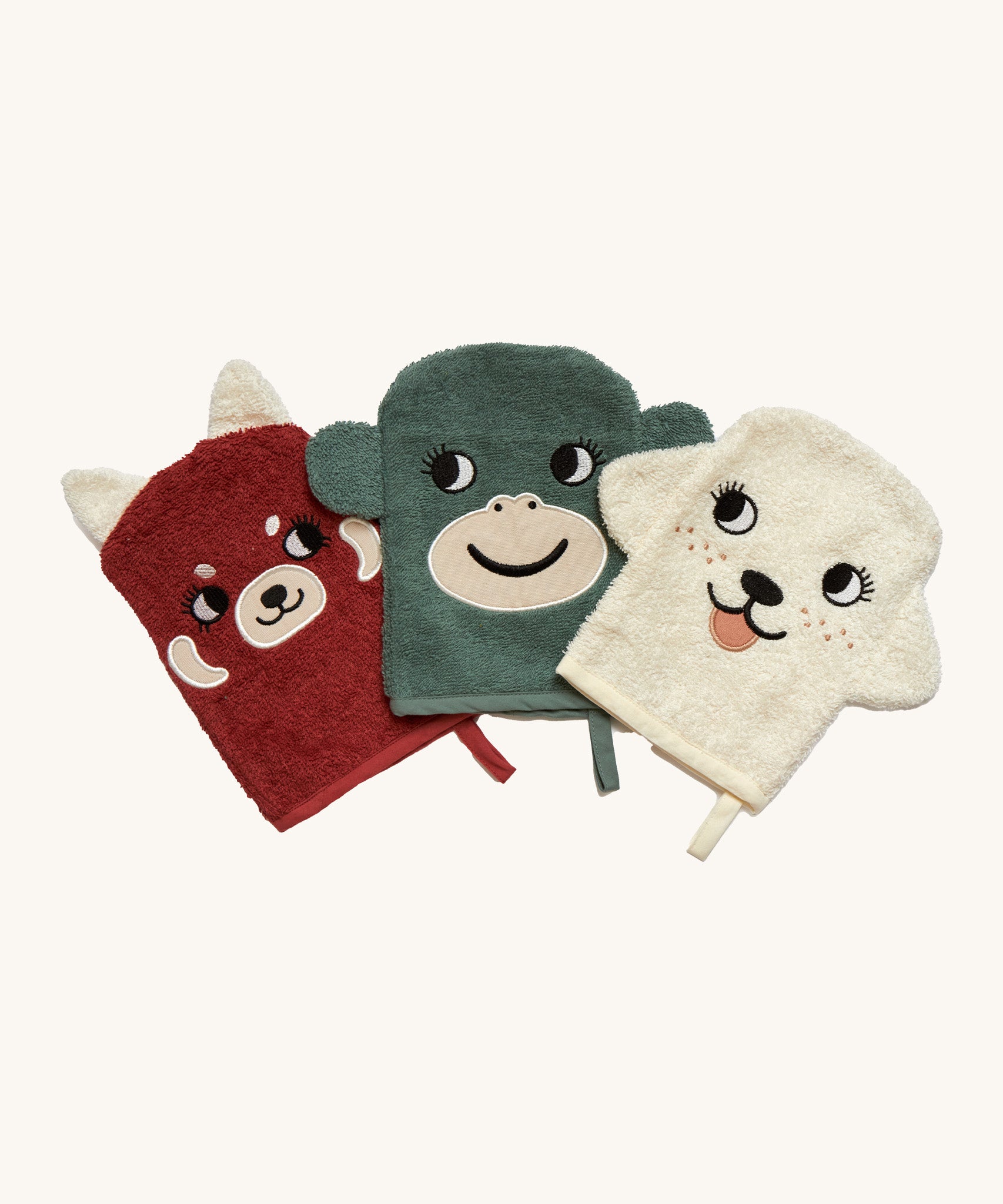 Roomate organic wash gloves. A set of 3 towelling style gloves in a red panda, monkey and dog design with playful facial features.