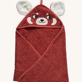 A hooded towel for children from Roommate, in a bright red colour with an embroidered red panda face on the hood and 3D panda ears. 