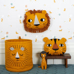A collection of Roommate Lion decorations and toys
