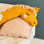  softly sleeping in a bedroom with other Roommate toys and items surrounding