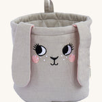 The Roommate Mini Quilted Basket - Bunny, in light grey. With floppy fabric ears and a sweet embroidered face, and a small fabric hook loop