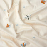 Roommate single organic cotton duvet set with a baby bugs print on a cream background. Close up of the print featuring bugs and butterflies.