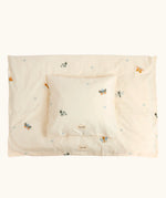 Roommate single organic cotton duvet set with a baby bugs print on a cream background. 