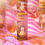 The Scrubber plastic-free natural deodorant with groovy packaging on a psychedelic background 