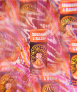 The Scrubber plastic-free natural deodorant with groovy packaging, on a psychedelic background