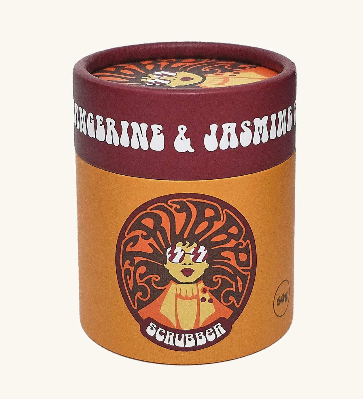 The Scrubber natural powder dry shampoo in 100% recycled cardboard packaging, in a tangerine and jasmine scent