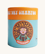 The Scrubber natural powder dry shampoo in 100% recycled cardboard packaging, in a ylang and rose scent