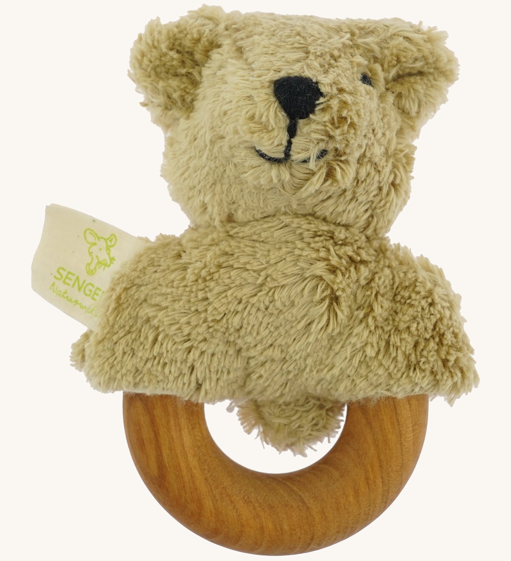 Senger Wooden Animal Grasping and Teething Toy - Bear. A smooth cherry wood ring with a plush bear head made of 100% organic cotton stuffed with sheep wool.